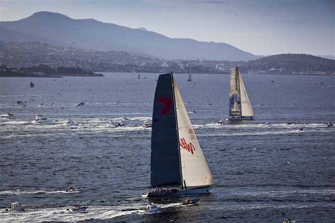 INVESTEC LOYAL and WILD OATS XI close to the finish line on the Derwent River - Rolex Sydney Hobart Yacht Race 2011 ©  Rolex/Daniel Forster http://www.regattanews.com